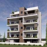  Two Bedroom Apartment For Sale in Universal, Paphos - Title Deeds (New Build Process)This project is a premium apartment development located in the heart of the tourist area just a short walk to Kings Avenue Mall, bars & restaurants, old market an Páfos 7700213 thumb0