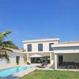  Situated near the village of Roquefort les Pins, close to shops, restaurants, schools and golf, an immaculate recent contemporary villa consisting of a vast reception with fireplace and open fitted kitchen with made to measure units and top quality applia Roquefort-les-Pins 3610269 thumb1