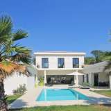  Situated near the village of Roquefort les Pins, close to shops, restaurants, schools and golf, an immaculate recent contemporary villa consisting of a vast reception with fireplace and open fitted kitchen with made to measure units and top quality applia Roquefort-les-Pins 3610269 thumb0