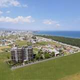  Lägenheter i ett komplex nära MacKenzia Beach i Iskele Cypern Tríkomo 8115235 thumb1