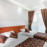  Комплекс апартаментов в Лимане, Коньяалты отельного типа люкс класса с большим бассейном и гарантией аренды Коньяалты 5120141 thumb40