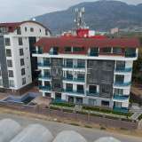  Готовые квартиры с видом на море и город в Аланье, Махмутлар Аланья 8125291 thumb0