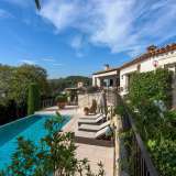  Charming villa located in a dominant position on the hills of Cannes of approximately 220 m2, with 3 bedrooms, a character lounge with a fireplace, a fitted kitchen, an office and an independent studio.Beautiful sea view and EstrelA magn Cannes 4128222 thumb2
