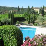  Delightful stone property built on a superb plot of land of 2985 m2, nicely manicured. On the edge of a small hamlet 10 minutes from Uzes, this L shaped renovated stone mas offer 260 m2 living space. Living/dining room opening to a nice covere Uzès 4036966 thumb1