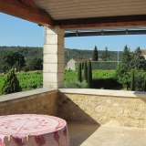  Delightful stone property built on a superb plot of land of 2985 m2, nicely manicured. On the edge of a small hamlet 10 minutes from Uzes, this L shaped renovated stone mas offer 260 m2 living space. Living/dining room opening to a nice covere Uzès 4036966 thumb5