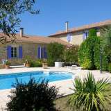  Delightful stone property built on a superb plot of land of 2985 m2, nicely manicured. On the edge of a small hamlet 10 minutes from Uzes, this L shaped renovated stone mas offer 260 m2 living space. Living/dining room opening to a nice covere Uzès 4036966 thumb0