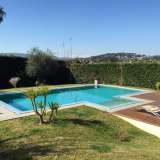  Located in a very residential area of Mougins, contemporary villa of 250 m2 (lounge of 80 m2, fully fitted kitchen, 5 bedrooms, 3 bathrooms, wine cellar, fitness room). High quality fixtures/fittings. Large terrace facing south and huge deck around pool.  Mougins 4045967 thumb5