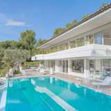  This contemporary minimalist villa of 450 m2 is the work of the famous architect Agazar, located on a parcel of land classified exceptional in Marseille of one hectare, in a peaceful privileged valley in Roucas Blanc facing the sea. Its clean  Marseille 3950262 thumb1