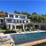 In the most sought-after area of Cannes, in a dominant position, splendid contemporary villa offering a panoramic view over the bay of Cannes, the old town and the Esterel Hills. Living surface: 500 m2. Land surface: 5000 m2. Bedrooms: 7 Cannes 4153708 thumb0