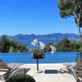  In the most sought-after area of Cannes, in a dominant position, splendid contemporary villa offering a panoramic view over the bay of Cannes, the old town and the Esterel Hills. Living surface: 500 m2. Land surface: 5000 m2. Bedrooms: 7 Cannes 4153708 thumb1