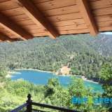  FOR SALE 3 stone Maisonettes of 65sqm each, built in 2010 with unlimited views of Lake Tsivlou, aluminum frames, individual oil heating, ideal for investment for tourist exploitation both during the winter and summer months, very close to:Athens - 2 a Akrata 8166248 thumb0