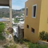  FOR SALE even and buildable plot of 80 sq.m. within the settlement, in Leros with underconstruction building of 60 sq.m., built in 2003, 2 levels, unfinished, with amphitheatrical sea views.Ideal for tourist exploitation just 400m from the sea (9 minutes  Agia Marina 7766889 thumb3