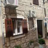  Traditional stone house in a row of houses Trpanj 8077152 thumb0