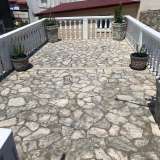  Traditional stone house in a row of houses Trpanj 8077152 thumb1
