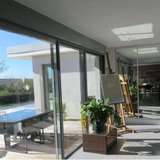  Beautiful architect villa  minutes away from Uzes.  Built in 2011.  Quality building and materials.  The ground floor consists of a pacious and bright living room opening onto the garden through large sliding doors  offering a panoramic, breathtaking view Uzès 2479593 thumb3