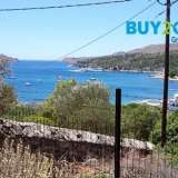  FOR SALE investment, plot, 358 sq.m. in Leros, in Lakki, fenced, sloping with amphitheatrical sea views from which it is 195m., with a building factor of 0.5 and a coverage of 70% builds about 180 sqm. Ideal for exploitation very close to the center, the  Leros 8008577 thumb1