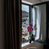  One-bedroom apartment 56m2 with a side sea view on the first line Rafailovici 7980184 thumb9