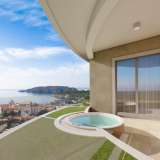  Bečići'deki yeni kompleks, yüzme havuzu, SPA ve deniz manzaralı bir veya iki yatak odalı dairelerin satışını içeriyor. Bečići 7980564 thumb6