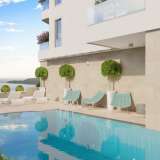  Bečići'deki yeni kompleks, yüzme havuzu, SPA ve deniz manzaralı bir veya iki yatak odalı dairelerin satışını içeriyor. Bečići 7980564 thumb8