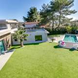  In the heart of Mougins with its golf course, International school and lovely places to eat, in a quiet very desirable residential area near to the centre of Cannes. 200 m2 (2152 sq.ft.) contemporary villa with a large bright inviting living r Mougins 3683824 thumb0