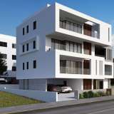  Two Bedroom Apartment For Sale in Universal, Paphos - Title Deeds (New Build Process)PRICE REDUCTION!! (WAS from €385,000 + VAT)A contemporary apartment development located in Paphos comprises of one and two bedroom apartments, speci Páfos 7586568 thumb7