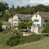  In the middle of the rolling hills of the Aveyron, this stunning  traditional stone farm buildings, with 8 bedrooms and 7 bathrooms, offers a tranquil base from which to run a boutique chambre d'hotes, a wedding venue or conference centre, or it coul Villefranche-de-rouergue 3987168 thumb0