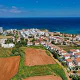  Large development plot with building permit in Ayia Triada just 200m from the sea. in a fabulous location close to the Golden Coast and Ayia Triada Harbour this plot already has plans for 4 villas drawn up and ready With access and services this is a grea Agia Triada 4690986 thumb3