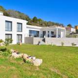  Super Cannes, situated in a quiet and peaceful residential located, in an elevated position, close to Cannes, a superb newly built contemporary style villa facing due south.Its living space includes an entrance hall leading through to a vast a Cannes 2896174 thumb0