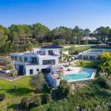  Ideally located in the heart of one of the most sought-after areas in Mougins, splendid contemporary villa offering spacious indoor volumes, and an open view onto the castle of Castellaras.Magnificent garden of more than 10,000 m2 with an over Mougins 4099077 thumb0