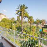  In a beautiful bourgeois residence in the centre of Beaulieu with caretaker, 2 steps from the port, beaches and shops, beautiful top floor apartment of approximately 130 m2 enjoying a beautiful view of the Port and a landscaped park with a pool. Beaulieu-sur-mer 4099083 thumb0