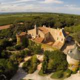  Wine Property in the stunning Languedoc region on 50 ha with Medieval Castle.Estate of which 45 ha are in one piece which wrap around the buildings.  There is a mature ancient wooded park, a Helipad.  About 2000 m2 of living space  Montpellier 4099090 thumb0